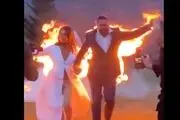 خوشحالی و خنده عجیب مهمانان به آتش گرفتن عروس و داماد وسط مراسم!