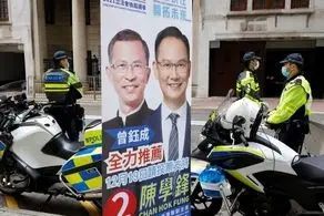 دولت هنگ‌کنگ از چه طریقی مردم را پای صندوق رأی می‌آورد؟