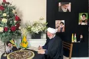 امضای دفتر یاد بود شهید سید حسن نصرالله توسط اژه‌ای