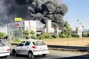 آتش سوزی انبار موادغذایی شرکت بهنوش در جاده کرج+فیلم